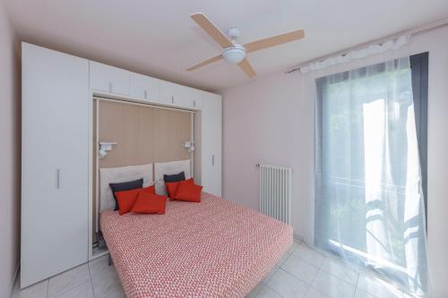Postel nebo postele na pokoji v ubytování Residence Villa Ada E203