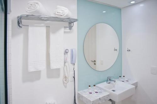 Um banheiro em Hotel Brisa Praia Pajuçara