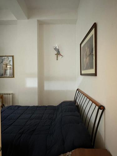 Monte Tauro Apartment tesisinde bir odada yatak veya yataklar