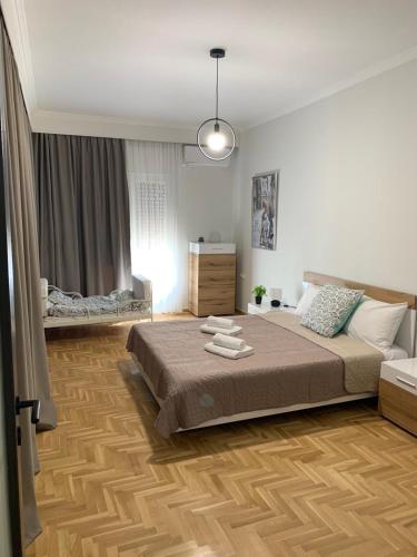 Ένα ή περισσότερα κρεβάτια σε δωμάτιο στο GREAT APARTMENT IN VERIA
