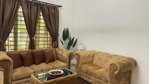 Mawar Casa Homestay Kluangにあるシーティングエリア