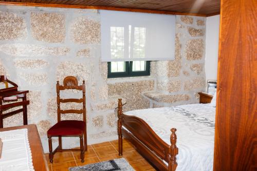 Ένα ή περισσότερα κρεβάτια σε δωμάτιο στο Casa de Gonçalo