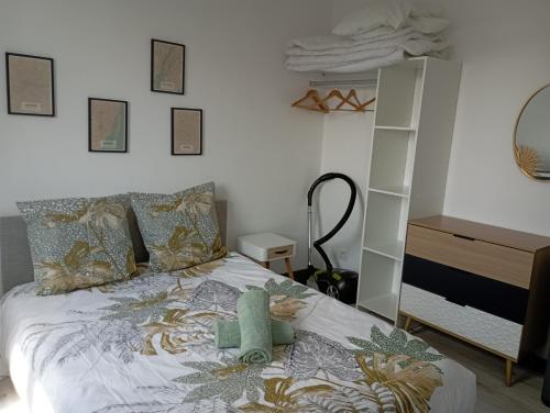 Ένα ή περισσότερα κρεβάτια σε δωμάτιο στο Charmant T2 proche Dunkerque