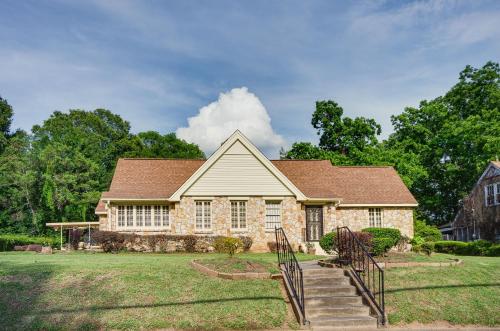 a stone house with stairs in front of it at Cozy Jackson Vacation Rental Less Than 1 Mi to University in Jackson