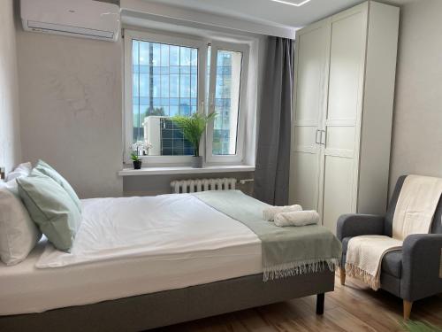 Krevet ili kreveti u jedinici u okviru objekta Emilii Plater 55 - Modern Full Apartment