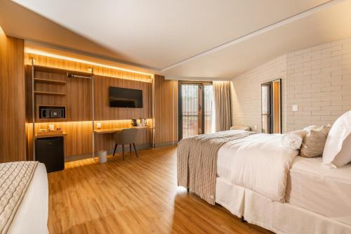 Ένα ή περισσότερα κρεβάτια σε δωμάτιο στο BA'RA Hotel