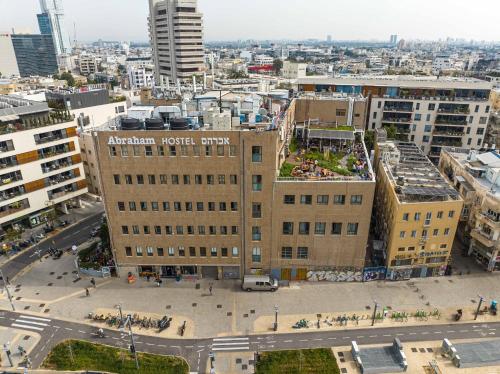 an aerial view of a city with buildings at Abraham Tel Aviv in Tel Aviv