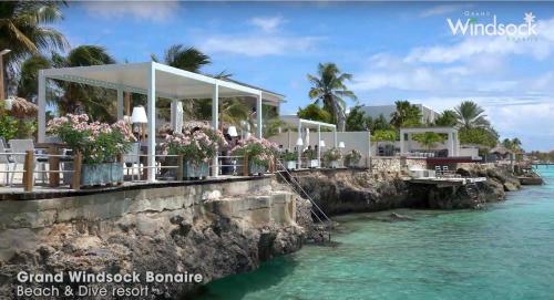 a wedding on the water at a resort on the beach at Grand Windsock Bonaire in Kralendijk