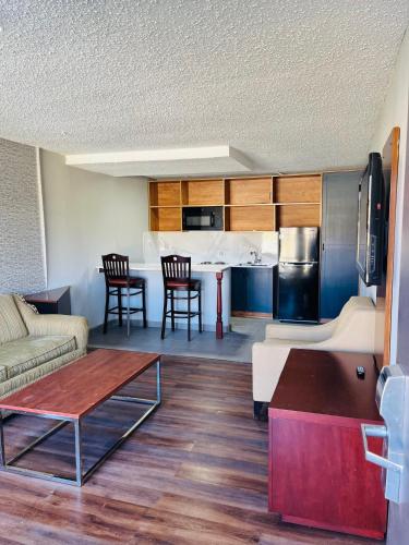 a living room with a couch and a table at North Villa extended stay in Houston