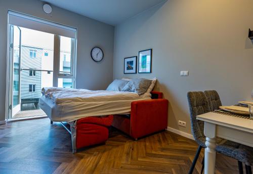 Ένα ή περισσότερα κρεβάτια σε δωμάτιο στο Iceland SJF Apartments - 301