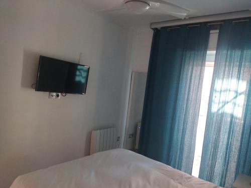 TV a/nebo společenská místnost v ubytování Casita playa