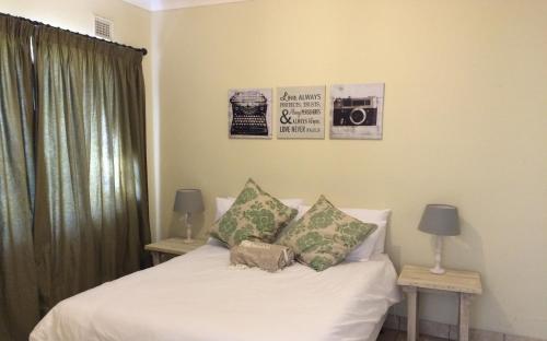 Postel nebo postele na pokoji v ubytování Moya Cottage