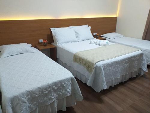 Katil atau katil-katil dalam bilik di Casa da Tetê