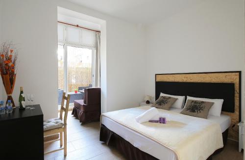 Posteľ alebo postele v izbe v ubytovaní Hostal Balkonis