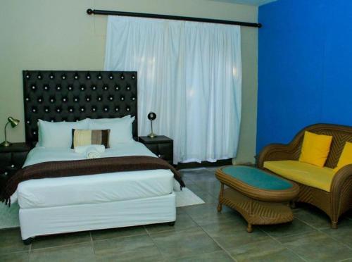 Cama o camas de una habitación en Ethithiya Guesthouse & Conferencing