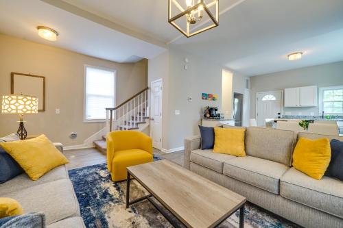a living room with a couch and a table at Wilmington Getaway Near Riverwalk and Downtown! in Wilmington