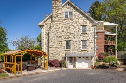 a stone house with a gazebo in front of it at Quakertown Vacation Rental Close to Hiking Trails in Quakertown