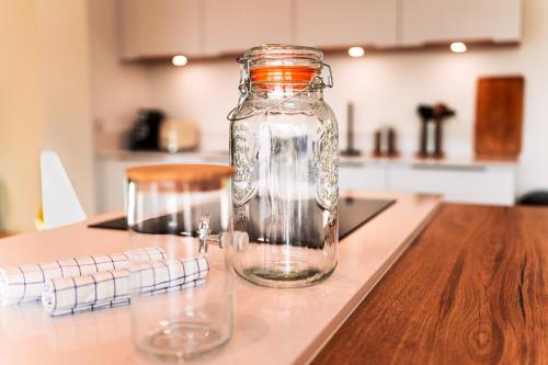 a glass jar sitting on top of a table at Villa confortable à Seignosse avec piscine privée in Seignosse