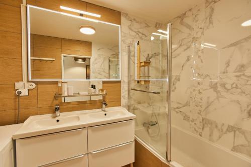 Kúpeľňa v ubytovaní Appartement avec belle vue dégagée du 11e étage