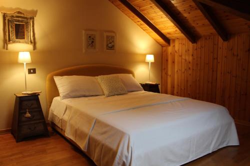 Una cama o camas en una habitación de Pieralda's Home