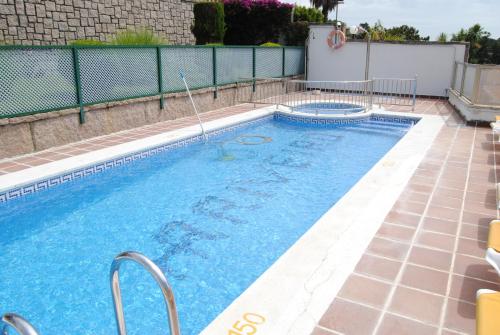 The swimming pool at or close to Hotel Riveiro