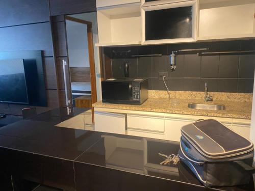 Kuchyň nebo kuchyňský kout v ubytování Apartamento Brasília, Águas Claras