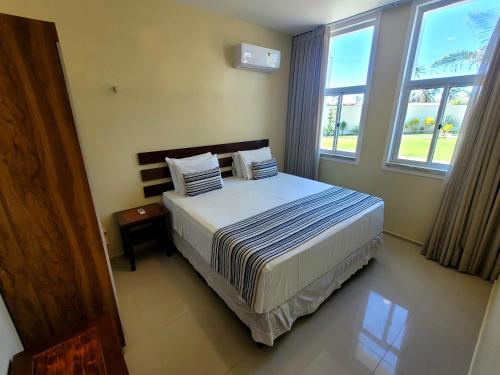 Cama o camas de una habitación en Sunset Beach Taíba Hotel
