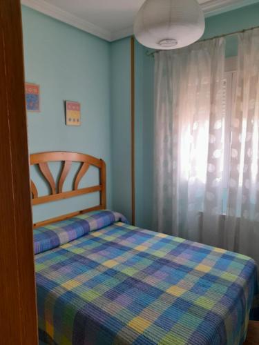 Ένα ή περισσότερα κρεβάτια σε δωμάτιο στο Casa Maria Luisa