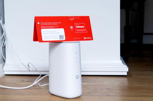 a red box sitting on top of a wii controller at Stay and Work Apartment - 8 single beds - central in Gronau