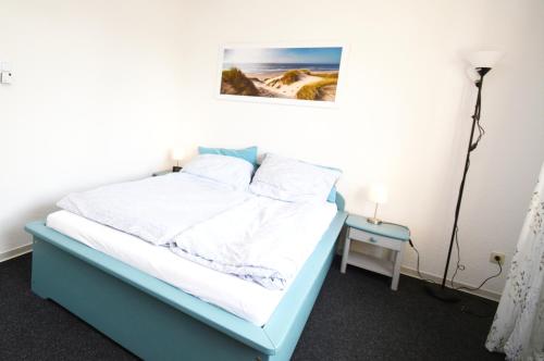 Postel nebo postele na pokoji v ubytování Ferien in der Villa Barlage - FeWo Ingrid