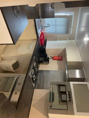 a kitchen with a sink and a stove at Mer et soleil in Les Sables Vignier