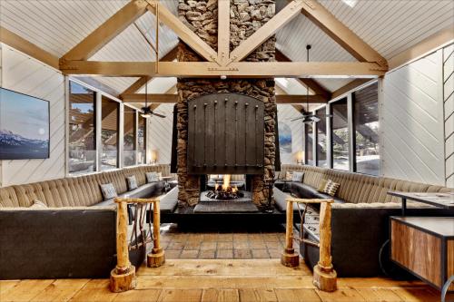 a lobby with couches and a fireplace at Outbound Mammoth in Mammoth Lakes