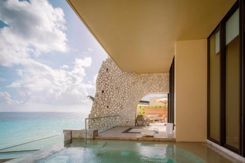 a view of the ocean from a villa at La Casa de la Playa by Xcaret- All Inclusive Adults Only in Playa del Carmen