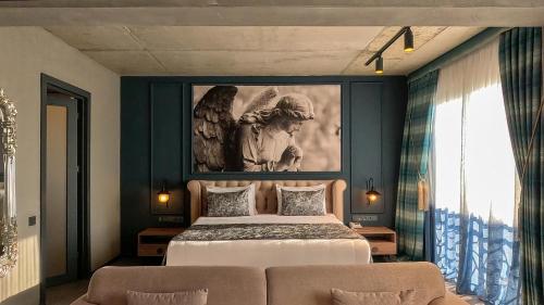 Katil atau katil-katil dalam bilik di Sandora Boutiuqe Hotel
