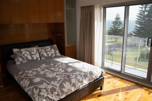 Ένα ή περισσότερα κρεβάτια σε δωμάτιο στο Bayfront Escape on Walpole