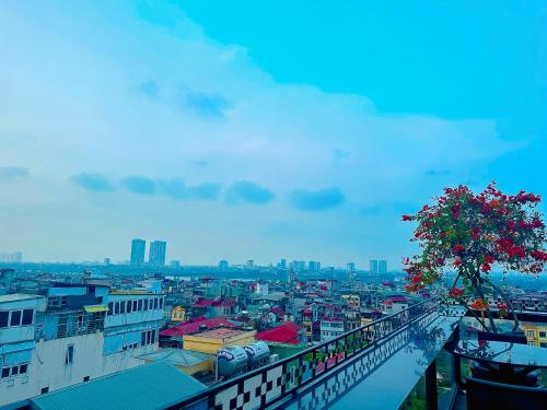 a view of a city from a balcony at Shining Central Hotel & Spa in Hanoi