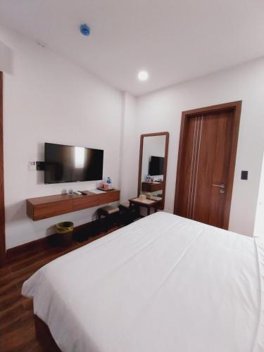 Santini Hotelにあるベッド