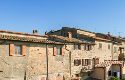 a group of old stone buildings with roofs at Stunning Home In Mazzolla With Wifi in Mazzolla