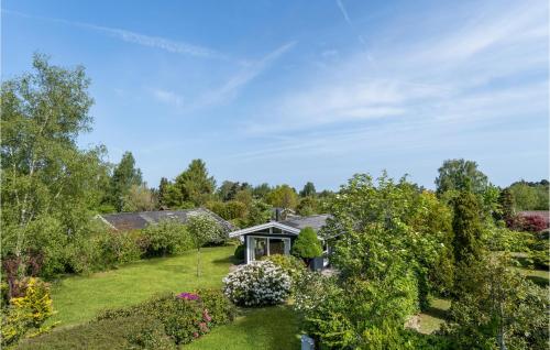 an aerial view of a garden with a house at Beautiful Home In Dronningmølle in Dronningmølle