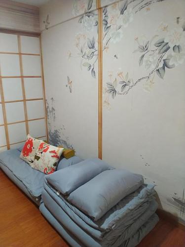 Llit o llits en una habitació de CloudView Japanese Theme, Amber Court, Genting Highlands, 1km from Centre, Free Wi-Fi