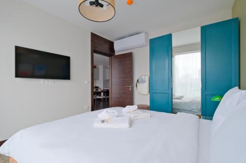Katil atau katil-katil dalam bilik di Air Başakşehir Residence by NewInn
