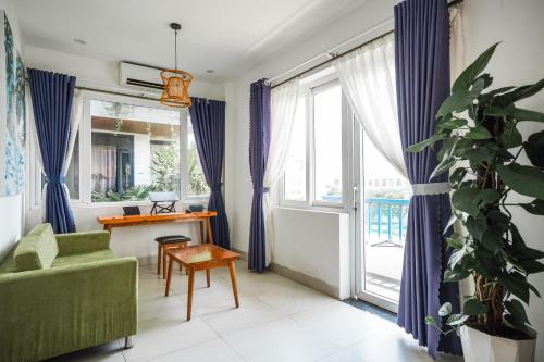Posezení v ubytování Cavilla Boutique Hotel & Apartment Da Nang