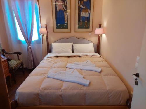 Postel nebo postele na pokoji v ubytování Kalypso Home F
