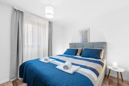 Ένα ή περισσότερα κρεβάτια σε δωμάτιο στο Apartment Sunny Sky