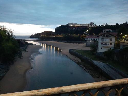 a view of a river from a bridge at La casa de Arantza con jardin y wifi in Ispáster