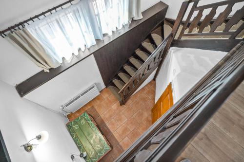 an overhead view of a staircase in a house at Pension Regina in Český Krumlov
