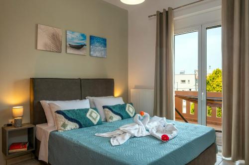 Postel nebo postele na pokoji v ubytování Armeria Apartments