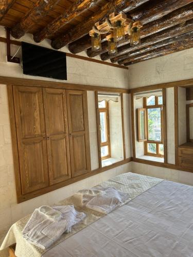 Ένα ή περισσότερα κρεβάτια σε δωμάτιο στο Melek BUTİK OTEL