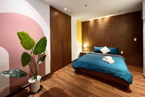 Ένα ή περισσότερα κρεβάτια σε δωμάτιο στο Family 3 bedrooms apt in Dalat Center Residence - The 2nd Home