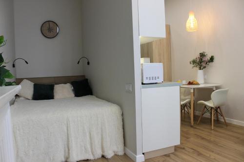 Ένα ή περισσότερα κρεβάτια σε δωμάτιο στο Comfort Life 93